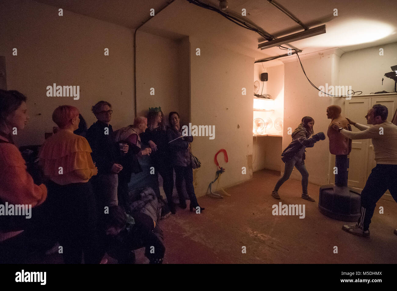 London, UK. 21st Feb, 2018. Audience members being taught how to box as part of Party Skills for the End of the World, an interactive theatre event by Nigel Barrett and Louise Mari at Shoreditch Town Hall in London. Photo date: Wednesday, February 21, 2018. Credit: Roger Garfield/Alamy Live News Stock Photo