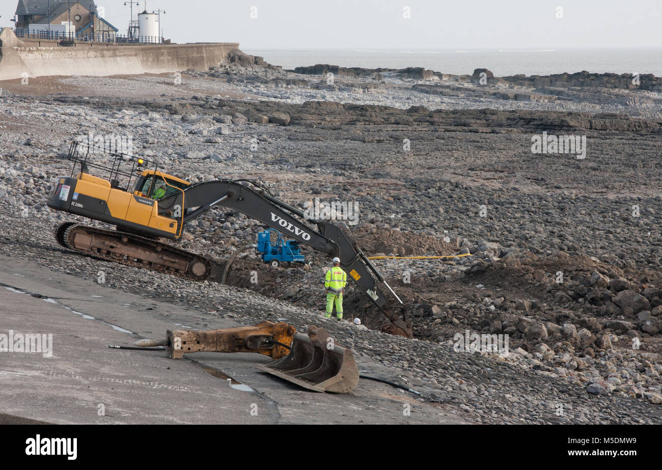 Porthcawl, UK. 22nd Feb 2018. Work started on replacement of Porthcawl's infamous concrete beach with a terreced structure in a sand colour. Credit: Andrew William Megicks/Alamy Live News. Stock Photo