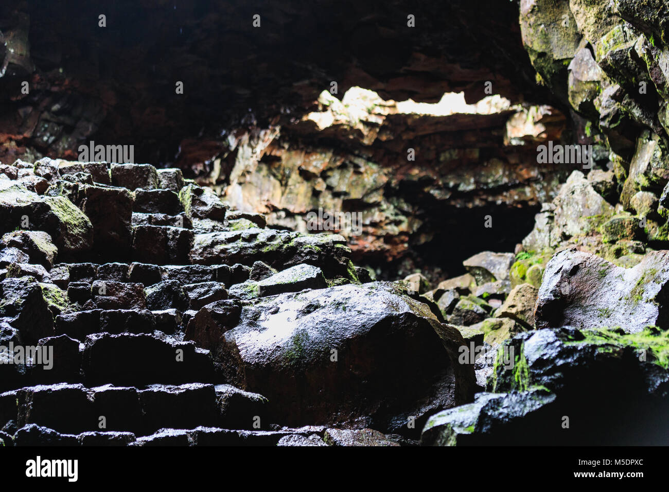 A hike through a lava cave in iceland tunnels are very narrow and