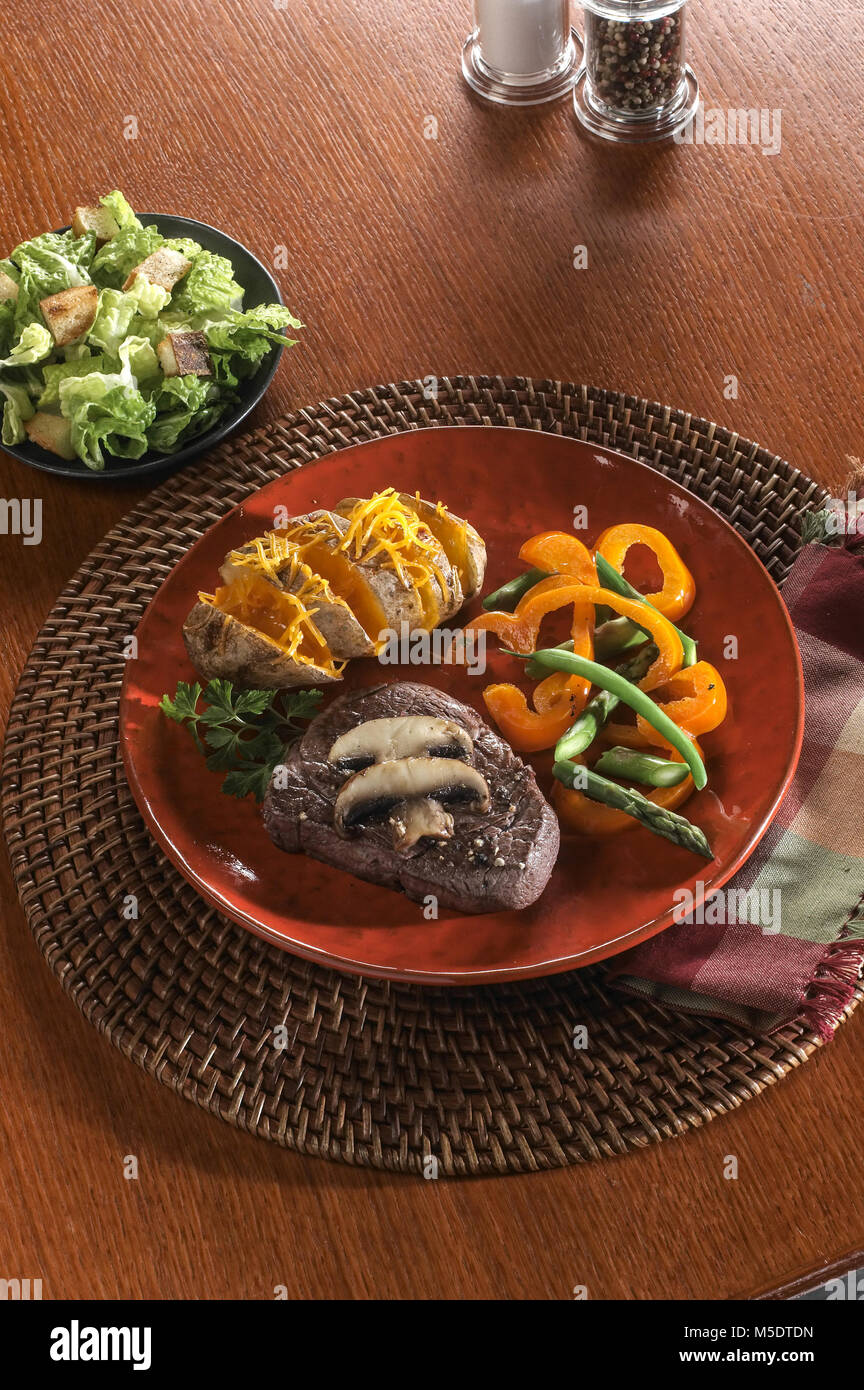 Beef & Baked Potato Dinner Stock Photo - Alamy