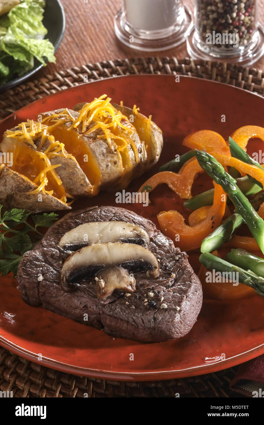 Beef & Baked Potato Dinner Stock Photo - Alamy