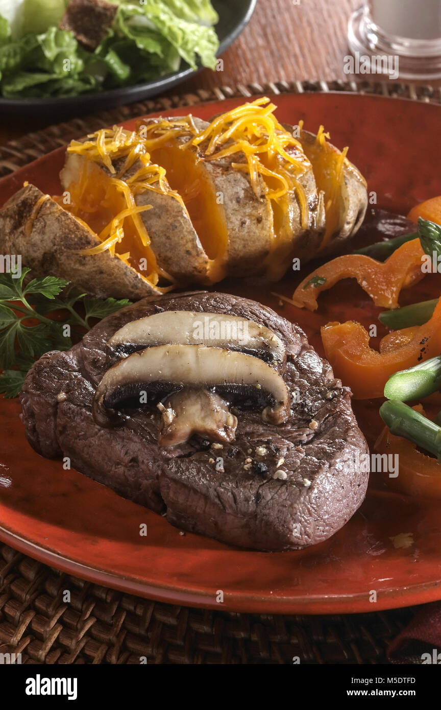Beef & Baked Potato Dinner Stock Photo - Alamy
