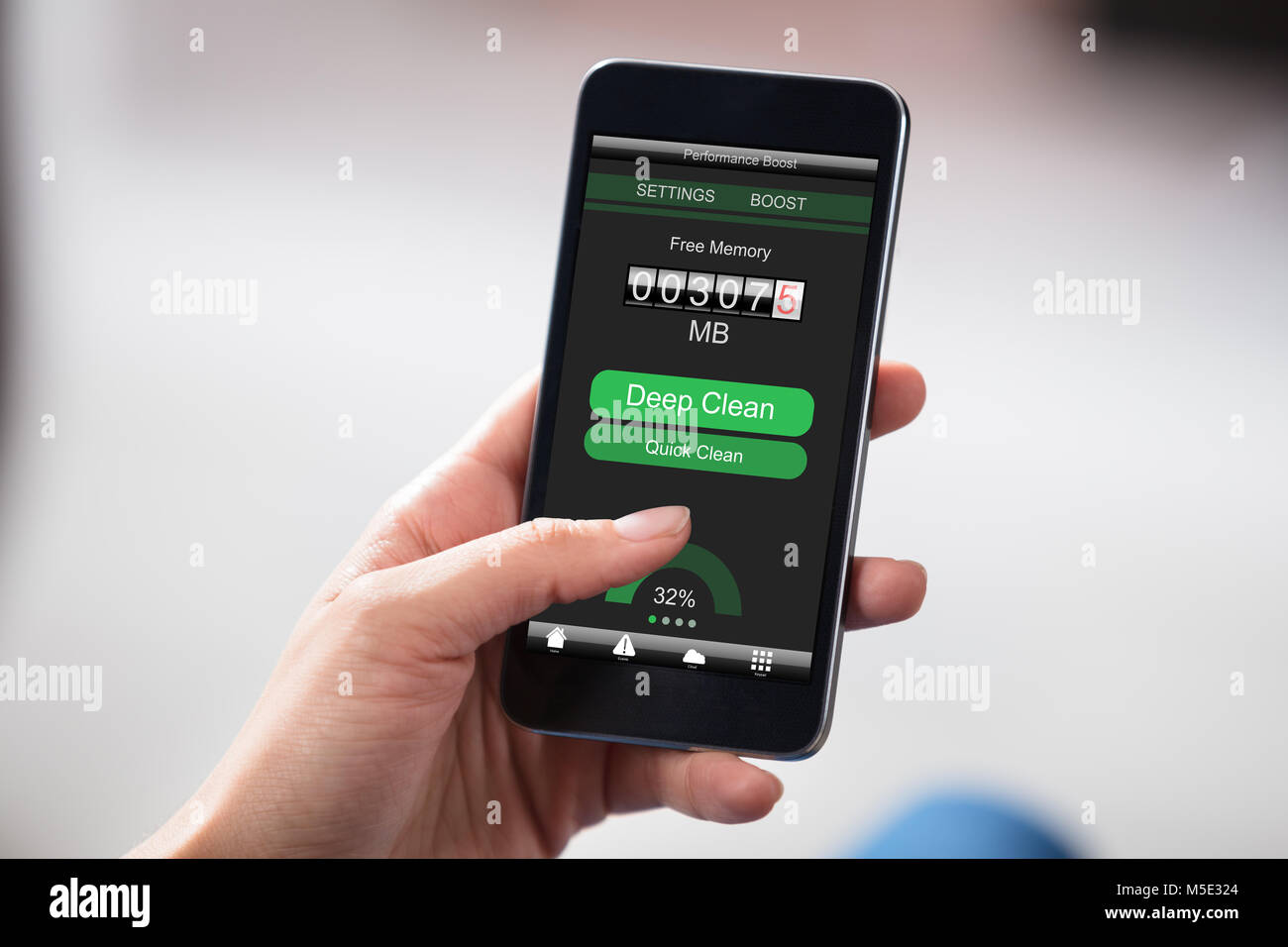 Phone Memory Screen Person Showing The Free Memory On Smart Phone Screen Stock Photo - Alamy