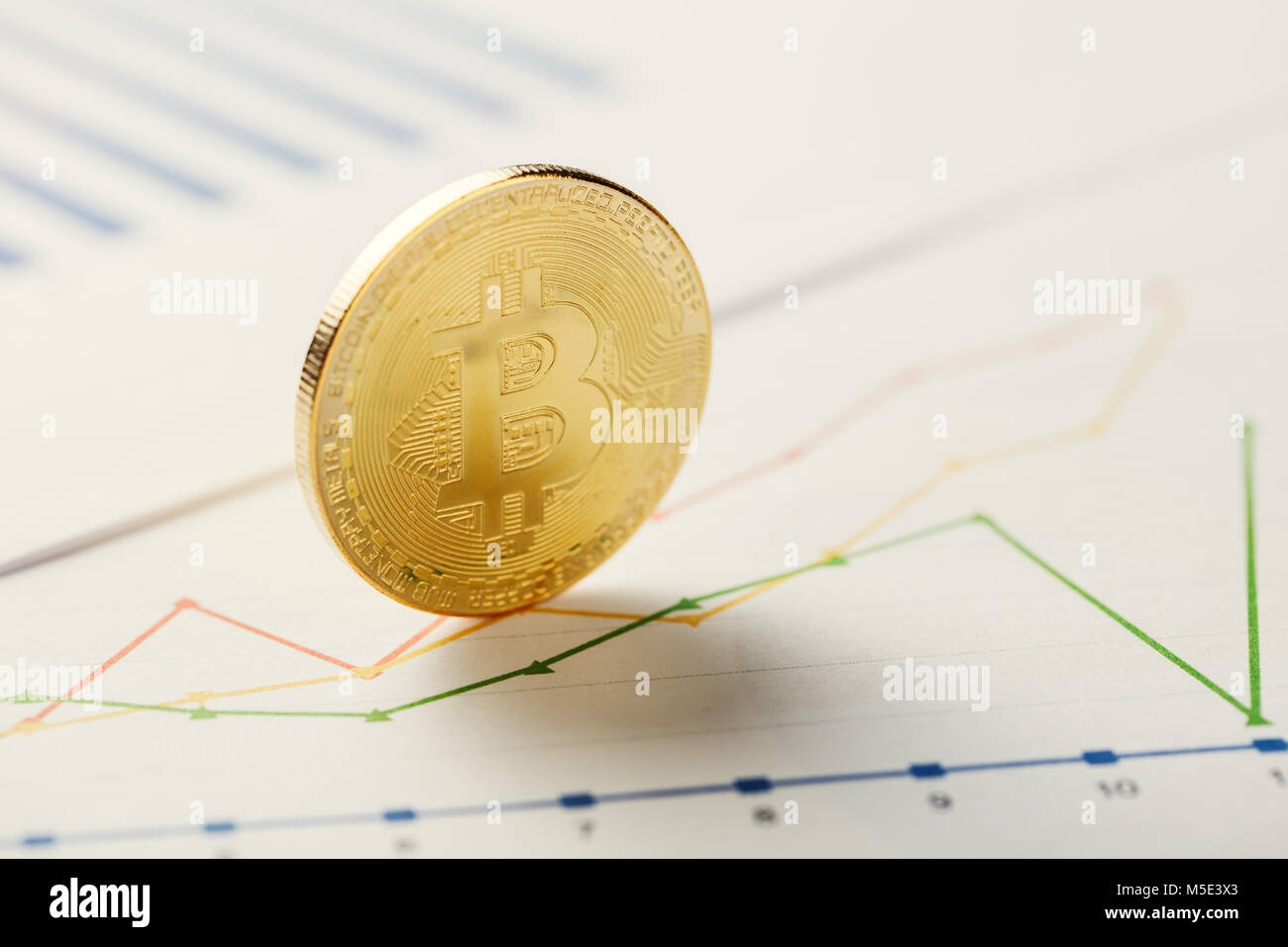 bitcoin with chart graph Stock Photo - Alamy