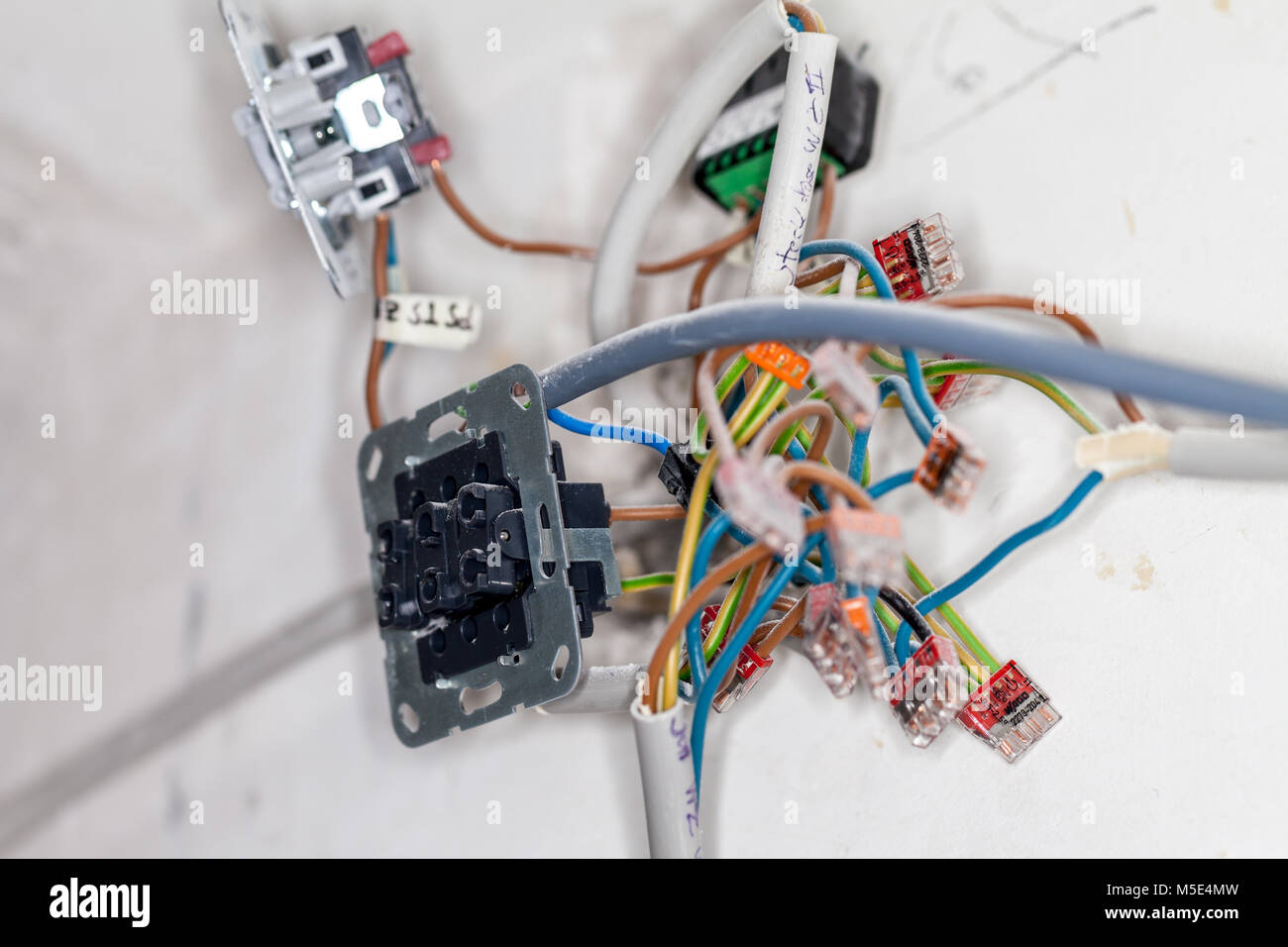 an open wall socket on construction site Stock Photo - Alamy