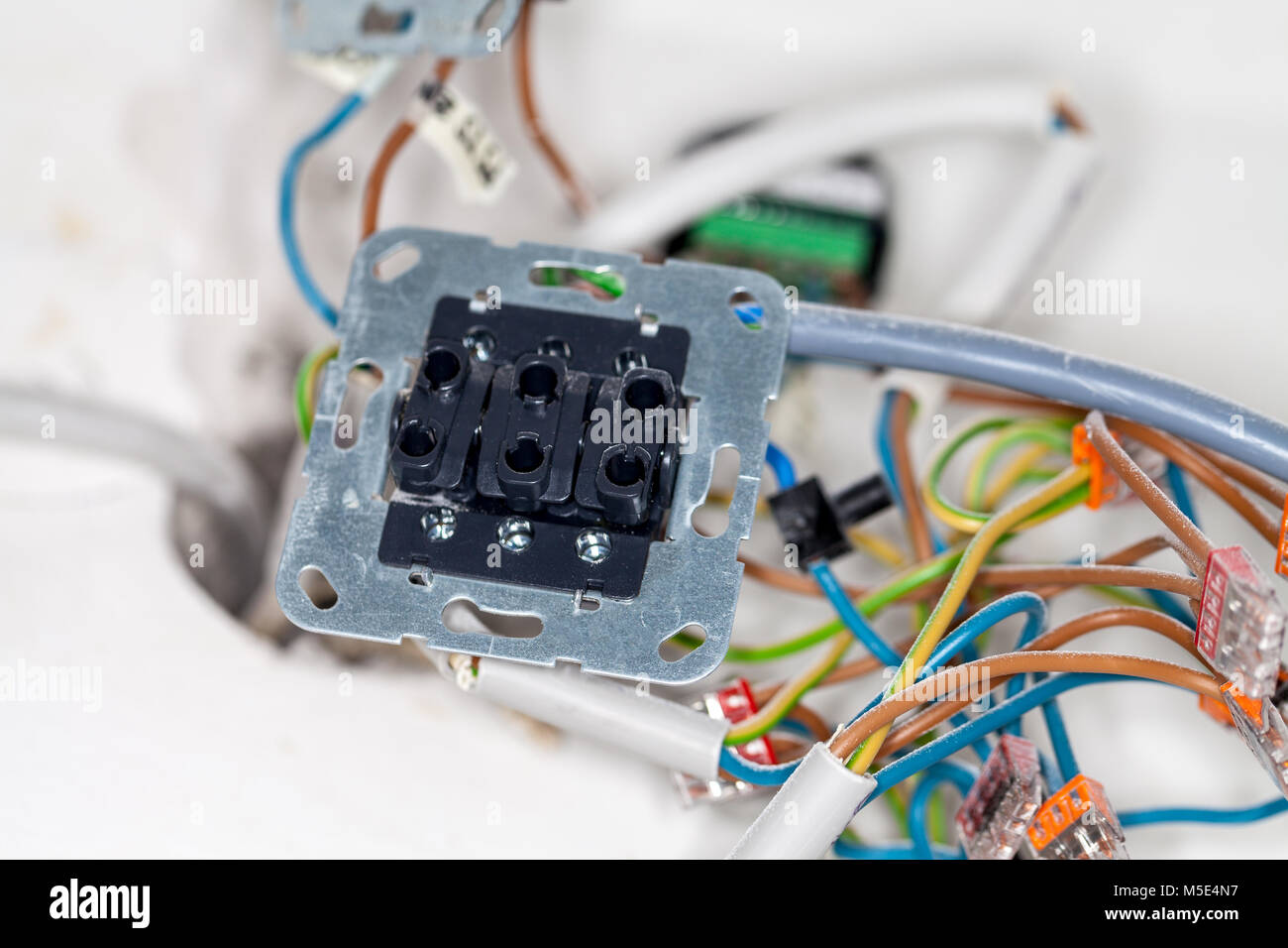 an open wall socket on construction site Stock Photo - Alamy