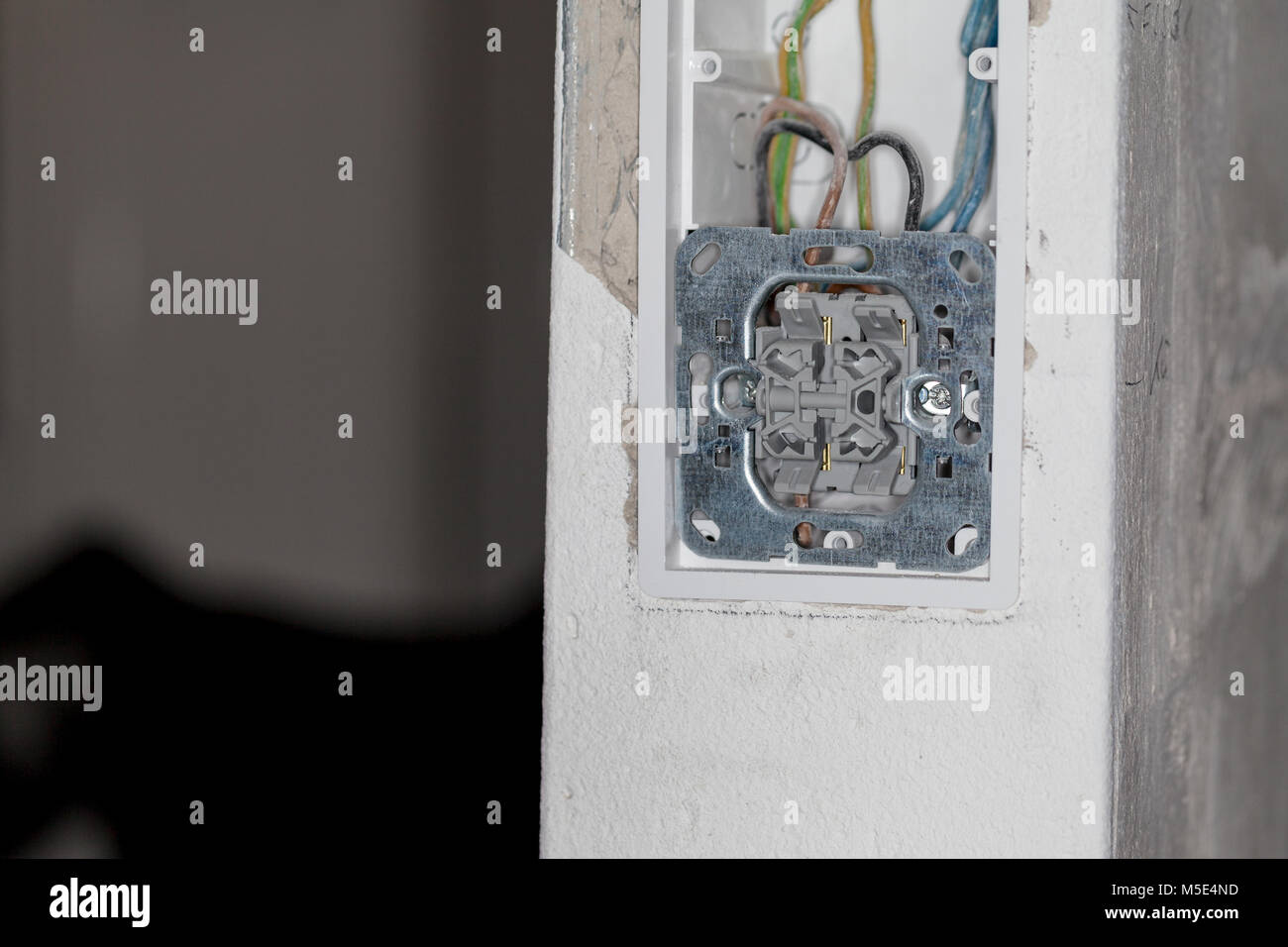 an open wall socket on construction site Stock Photo - Alamy