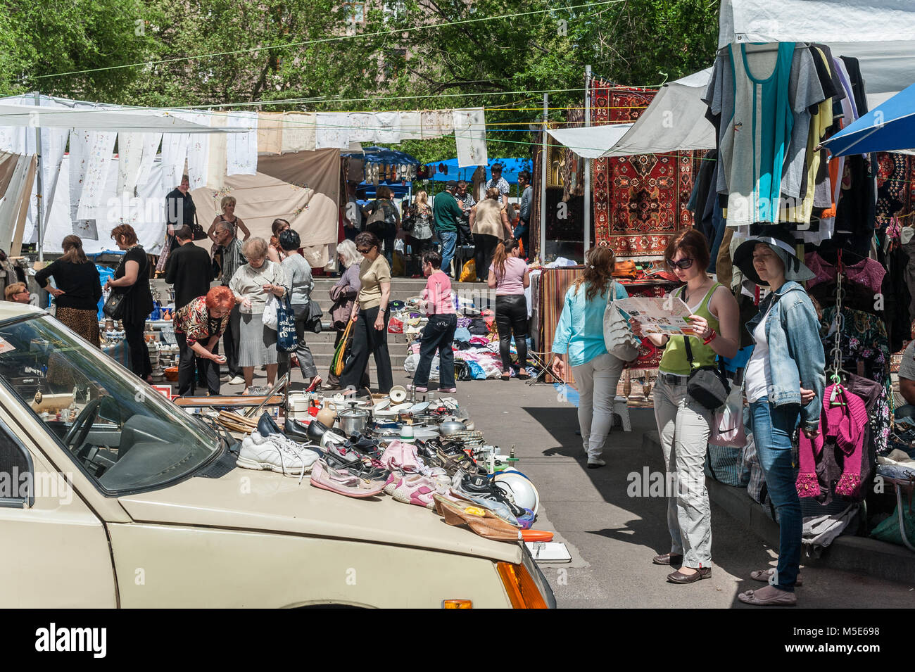 Two tourist at the flea market of Yerevan, Armenia. Stock Photo
