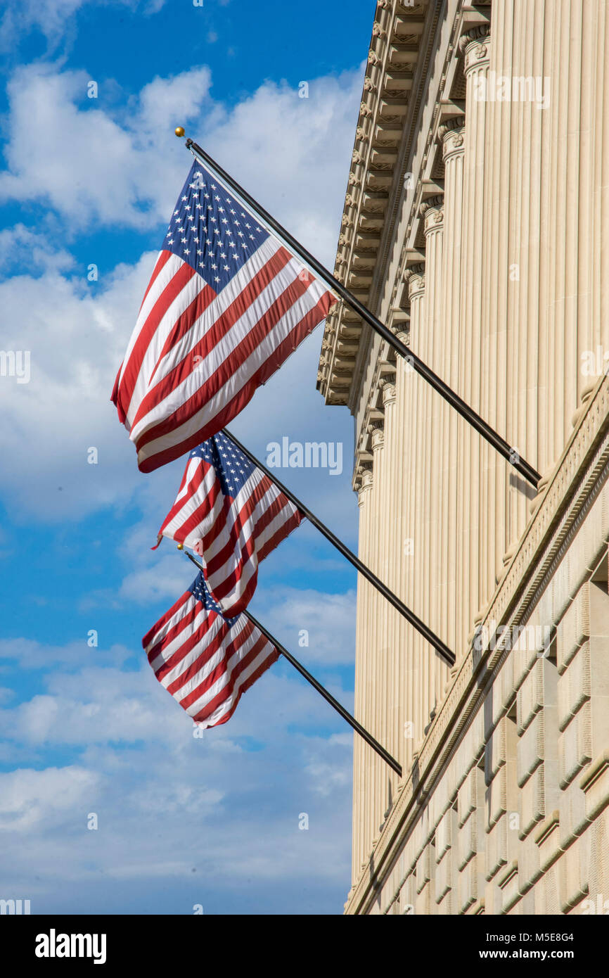 Flags on the Dept of Commerce building, part of the Federal Triangle  in Washington, DC. Stock Photo