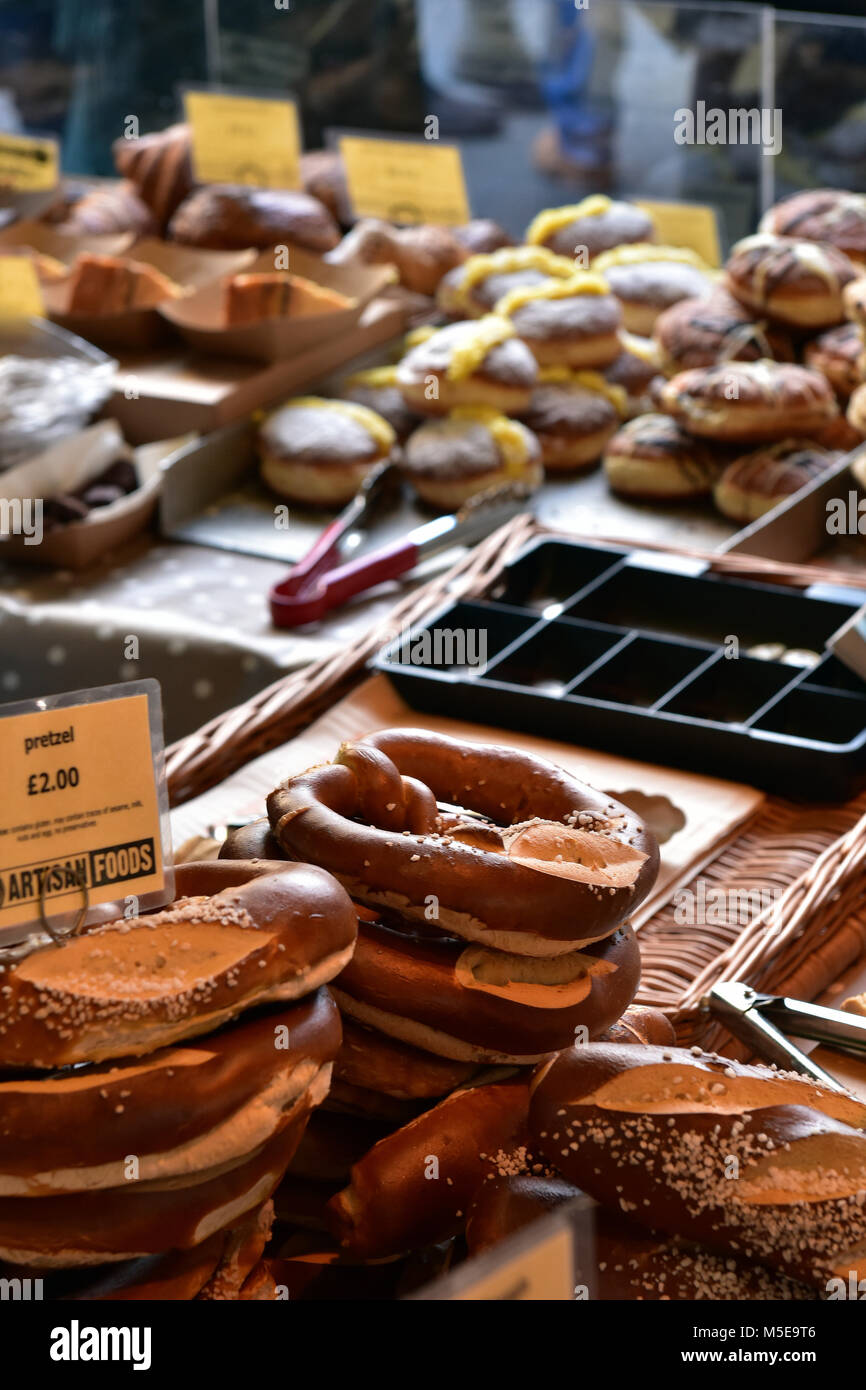 sugary treats cakes and confections for sale on a stall at borough