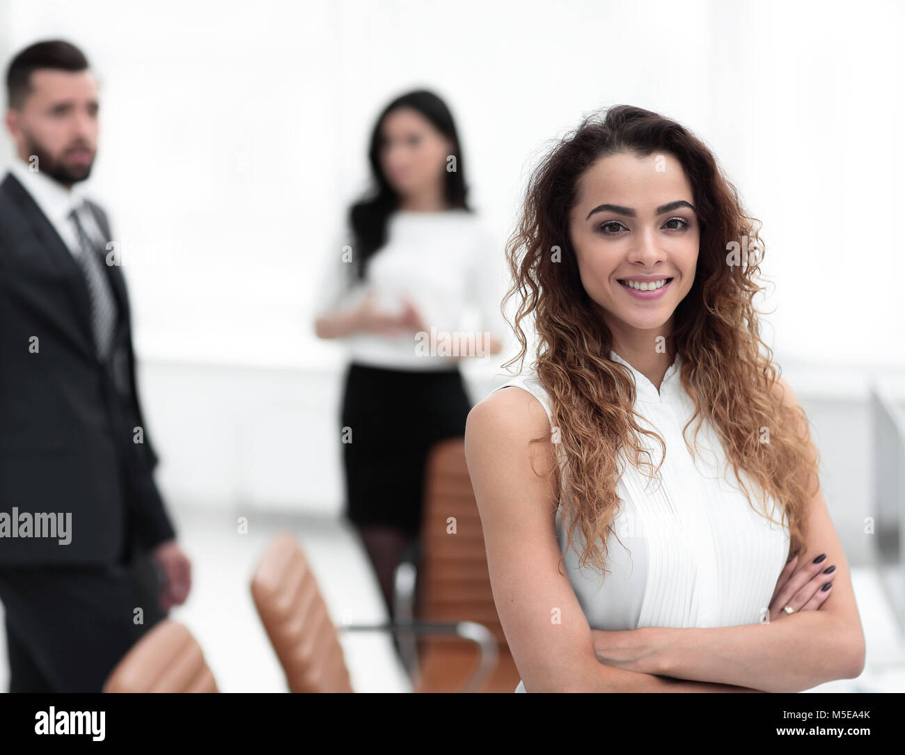 business woman on the background of business team Stock Photo - Alamy
