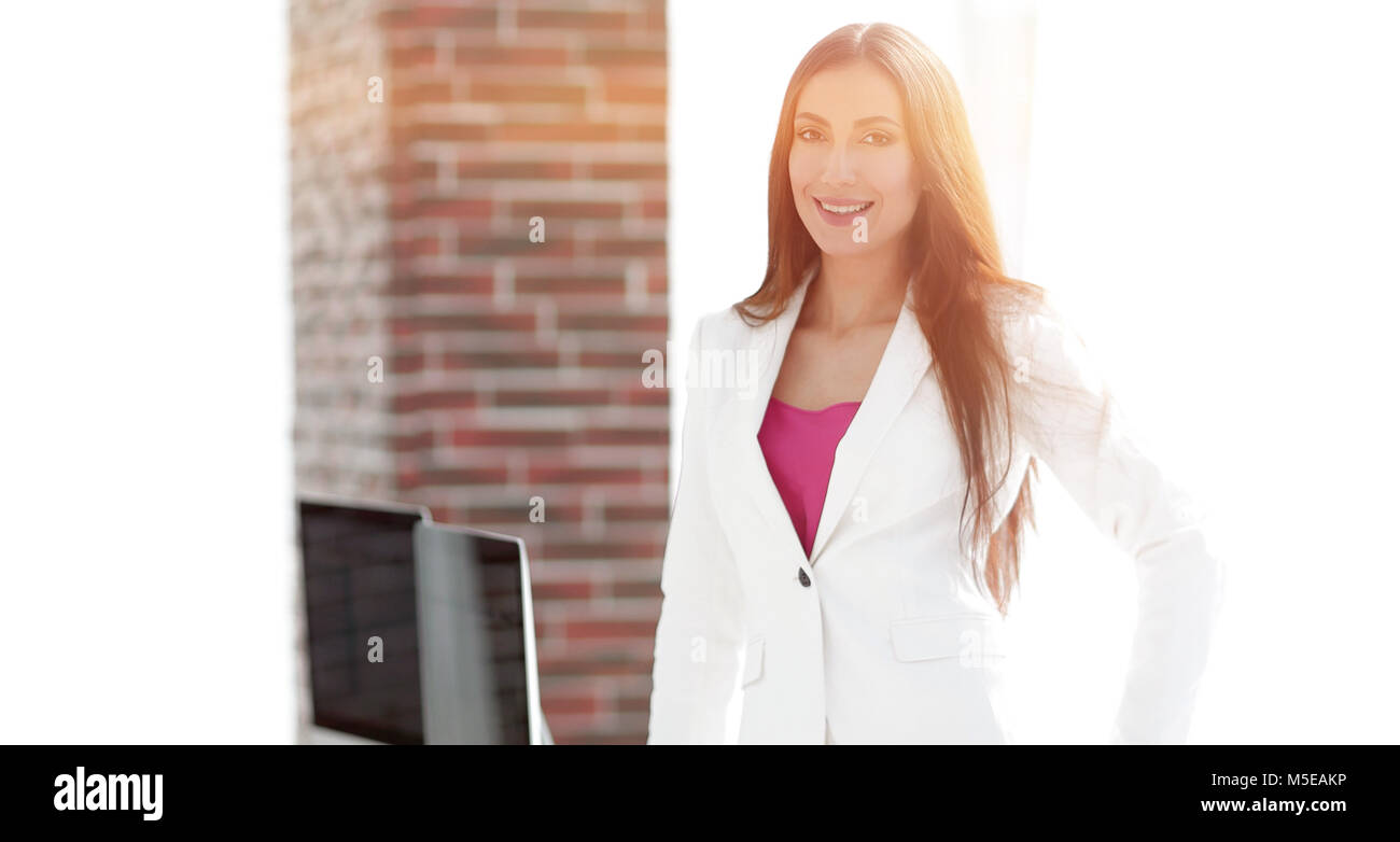 elegant business woman in a white business suit Stock Photo - Alamy