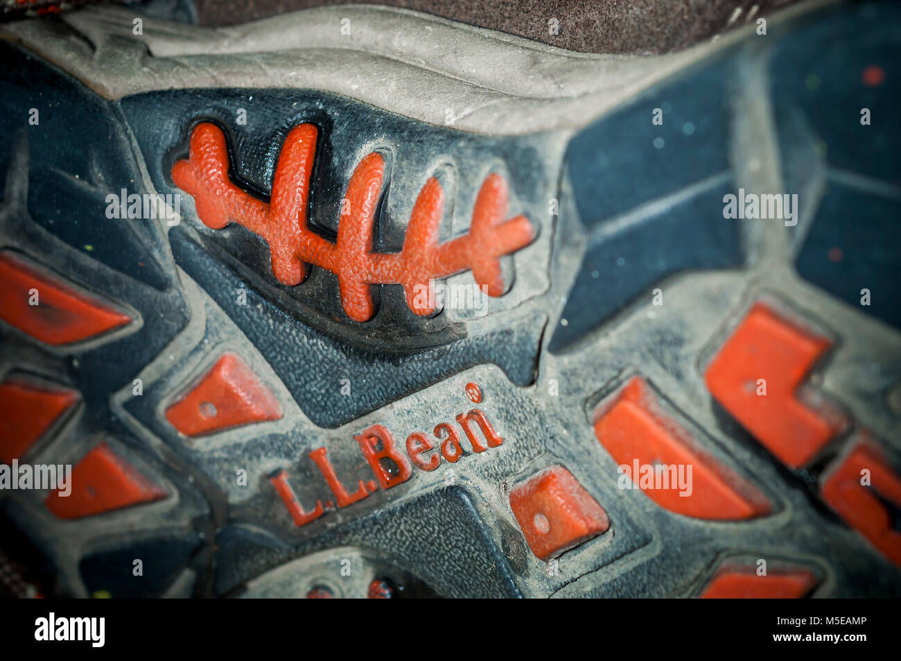 The sole of a wellworn pair of L.L. Bean boots, ready to be returned