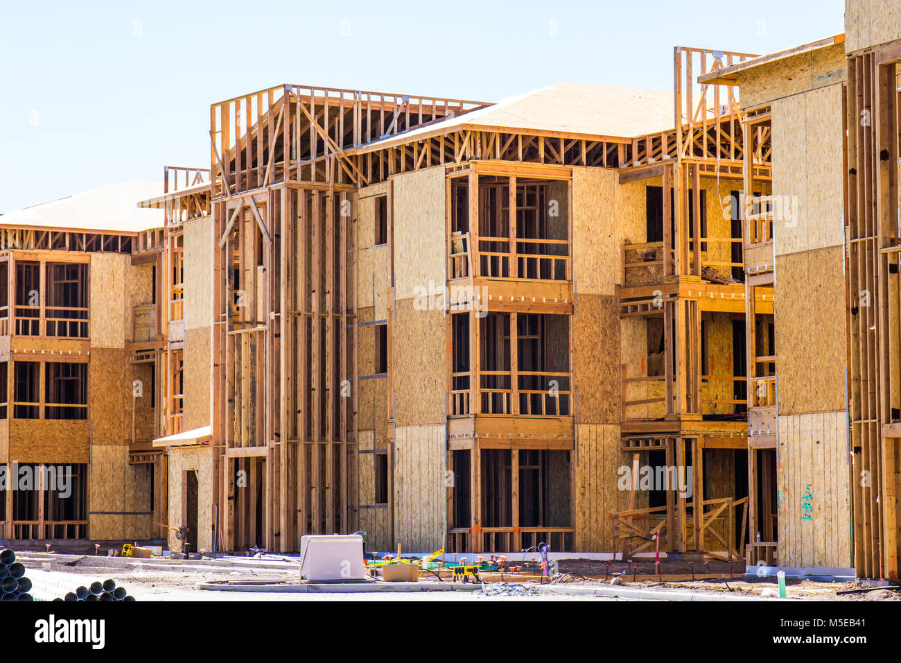 new-three-story-apartment-building-under-construction-stock-photo-alamy