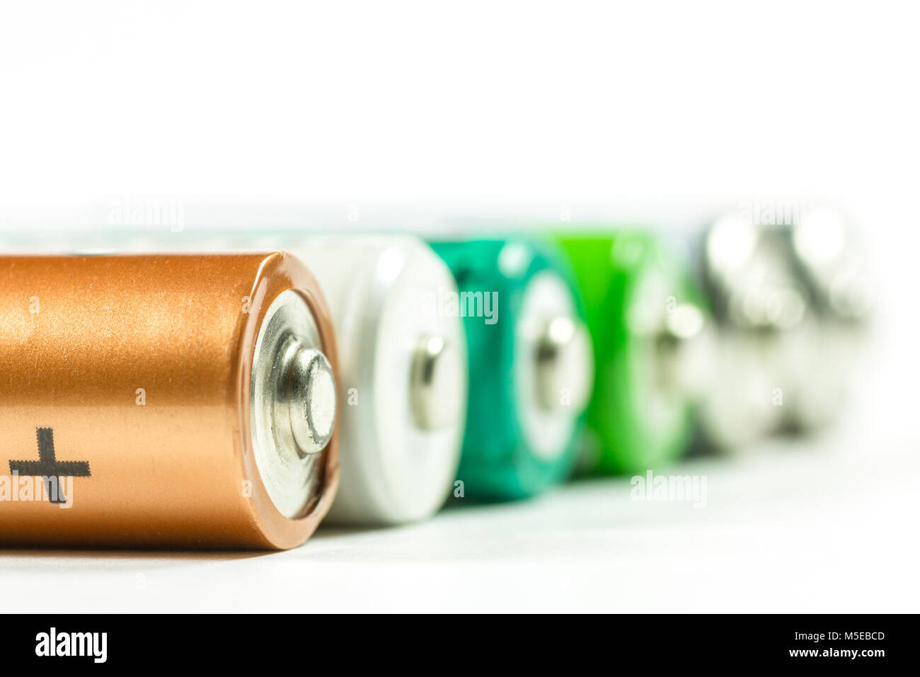 selection of regular and rechargeable batteries isolated on white