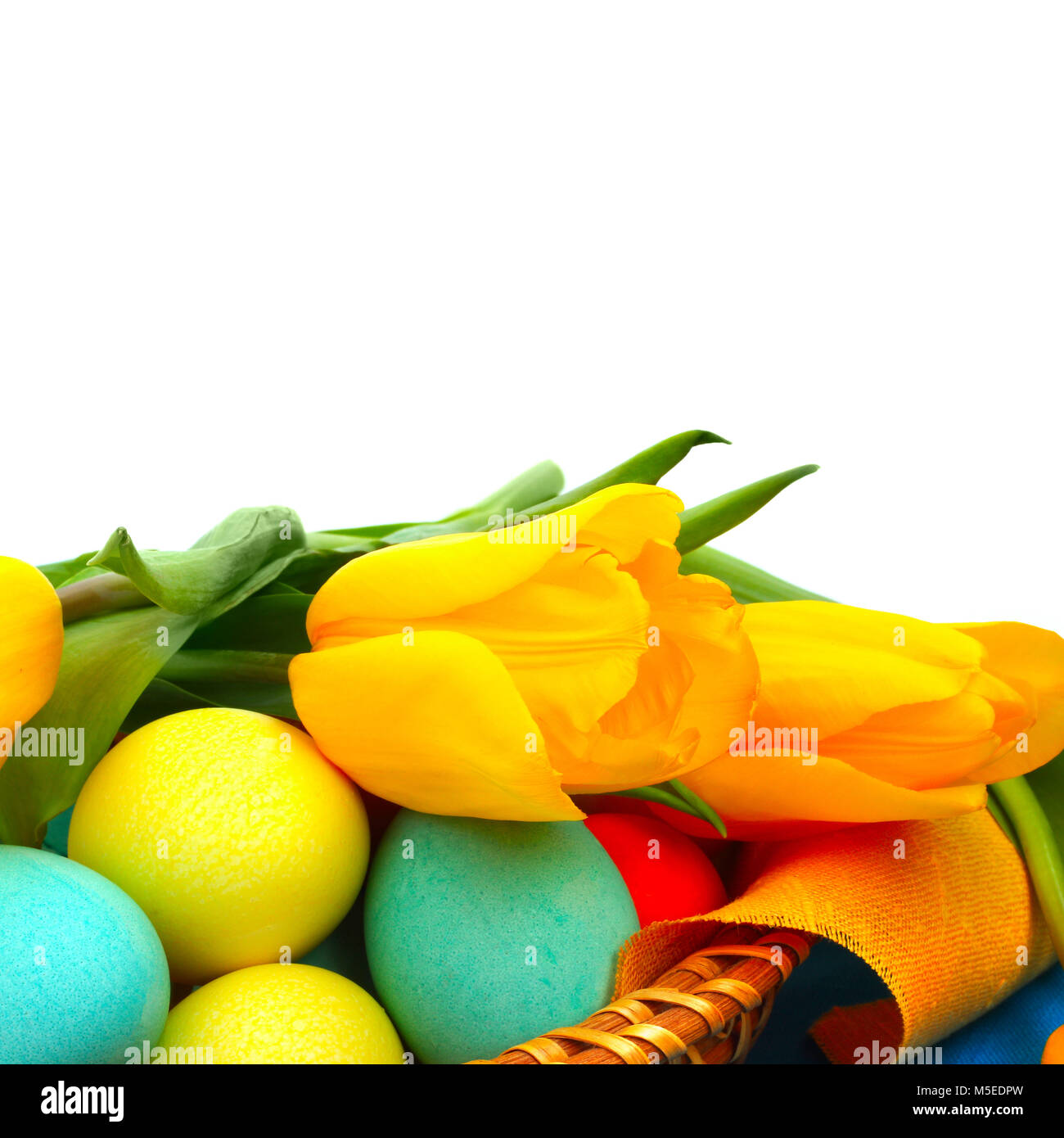 Colorful easter eggs in basket and tulips isolated on white Stock Photo ...