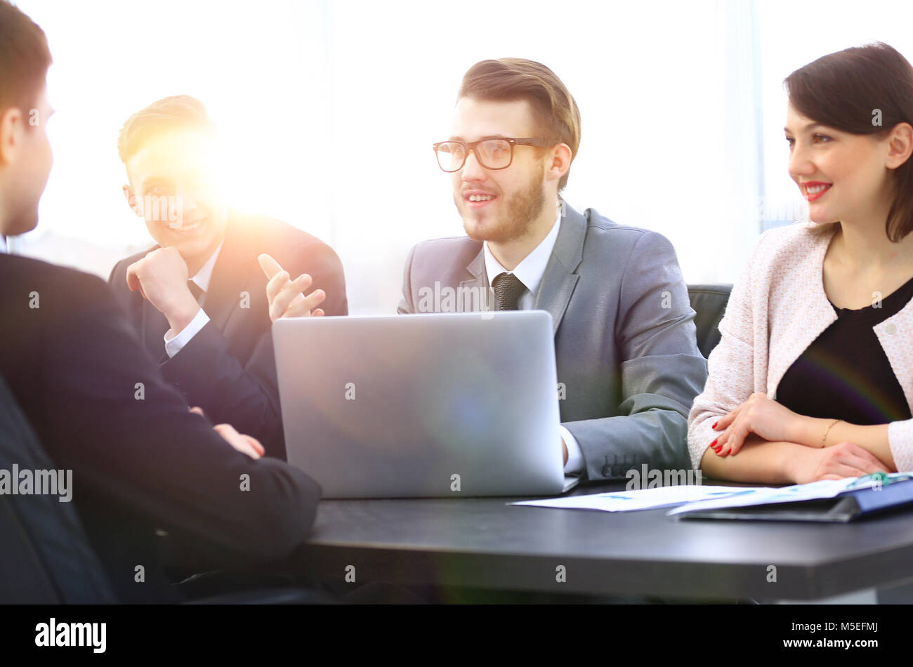 Business woman in workplace communicates hi-res stock photography and ...