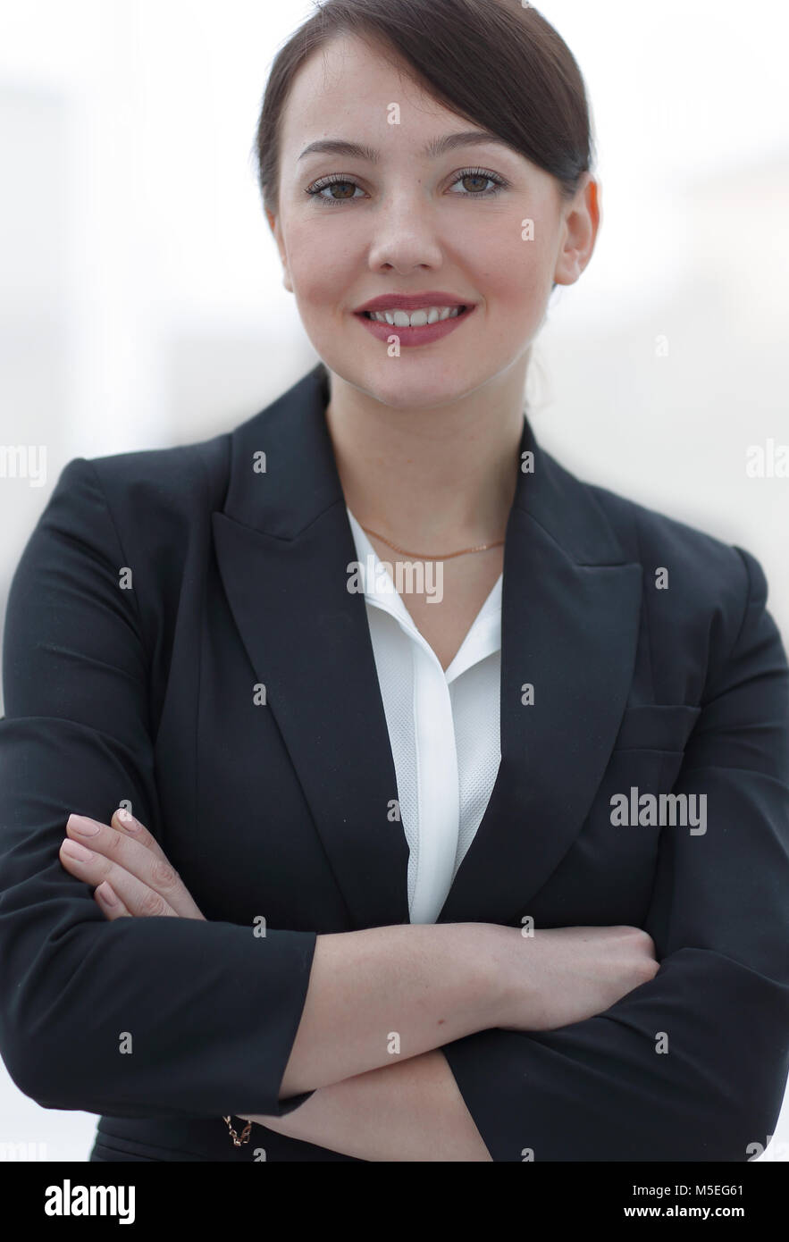 successful young business woman on the background of the office Stock ...