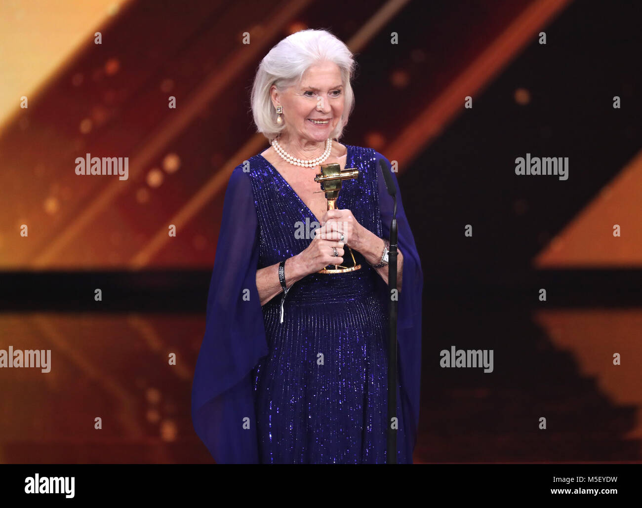 22 February 2018, Germany, Hamburg, 53rd Golden Camera Awards: Actress Christiane  Hoerbiger stand with her trophy on stage after being awarded in the  category 'Live's work'. Photo: Christian Charisius/dpa-Pool/dpa Stock Photo  -
