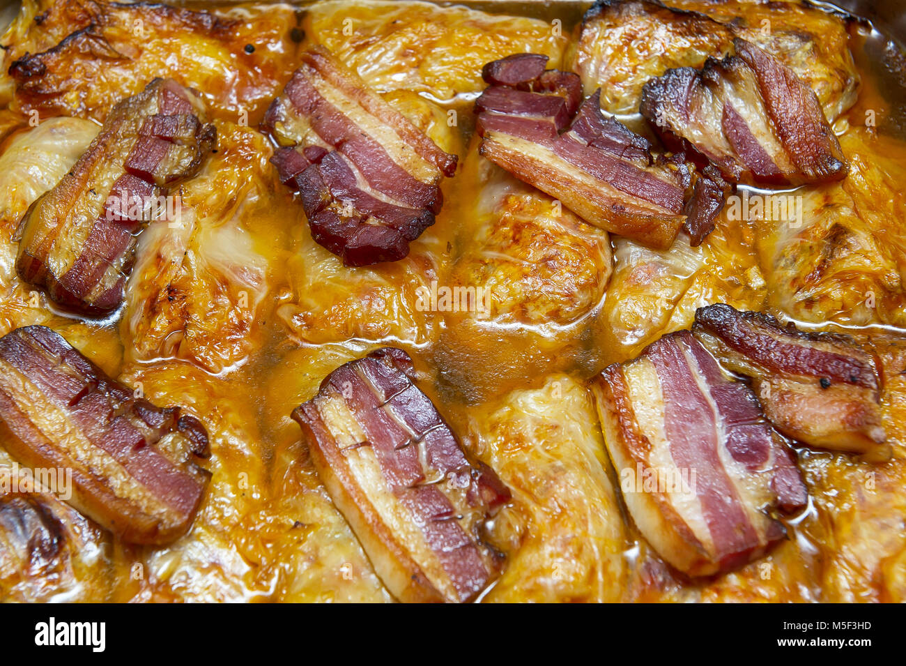 Cabbage casserole with bacon Stock Photo Alamy