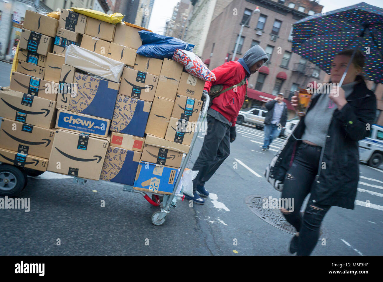 A deliveryman from Lasership travels through the Chelsea neighborhood