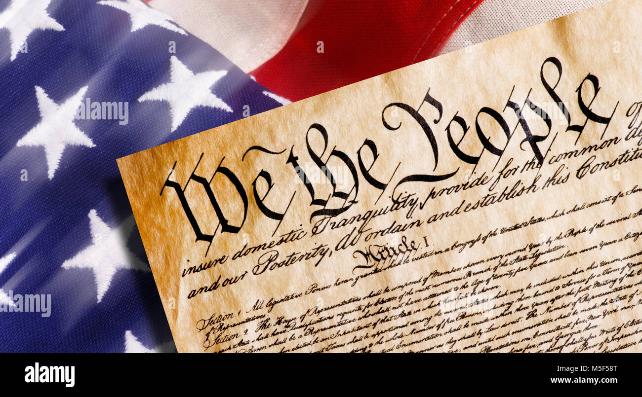 Constitution of America, We the People withAmerican flag. Stock Photo