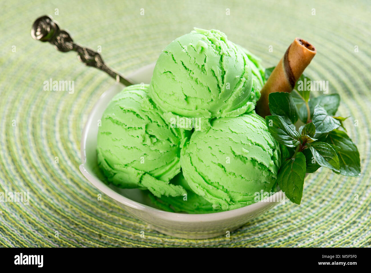 Mint ice cream on dining table Stock Photo Alamy