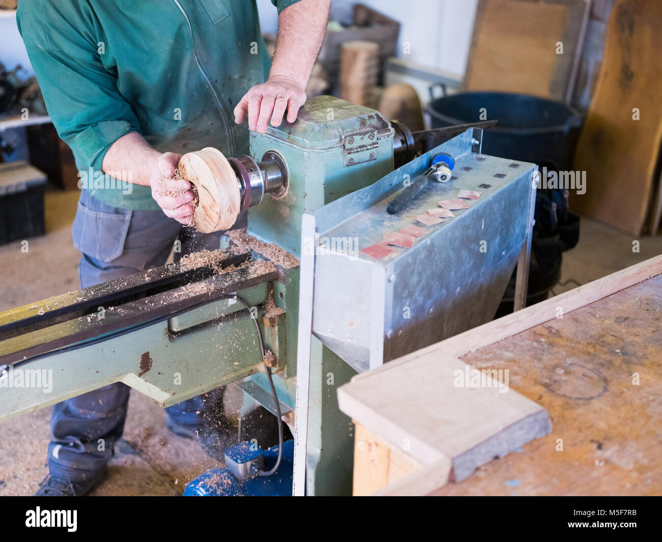 A woodworker, demonstrating spinning. Stock Photo
