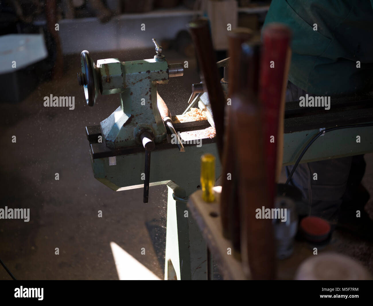 A woodworker, demonstrating spinning. Stock Photo