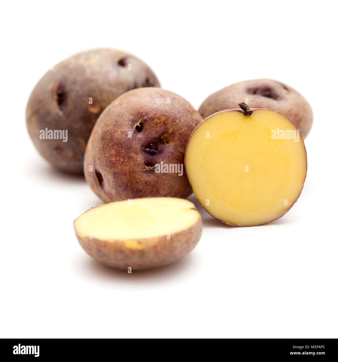 potatoes of Tenerife, Canary Islands, papa bonita, i.e. pretty potato, old variety of potatoes isolated on white background Stock Photo