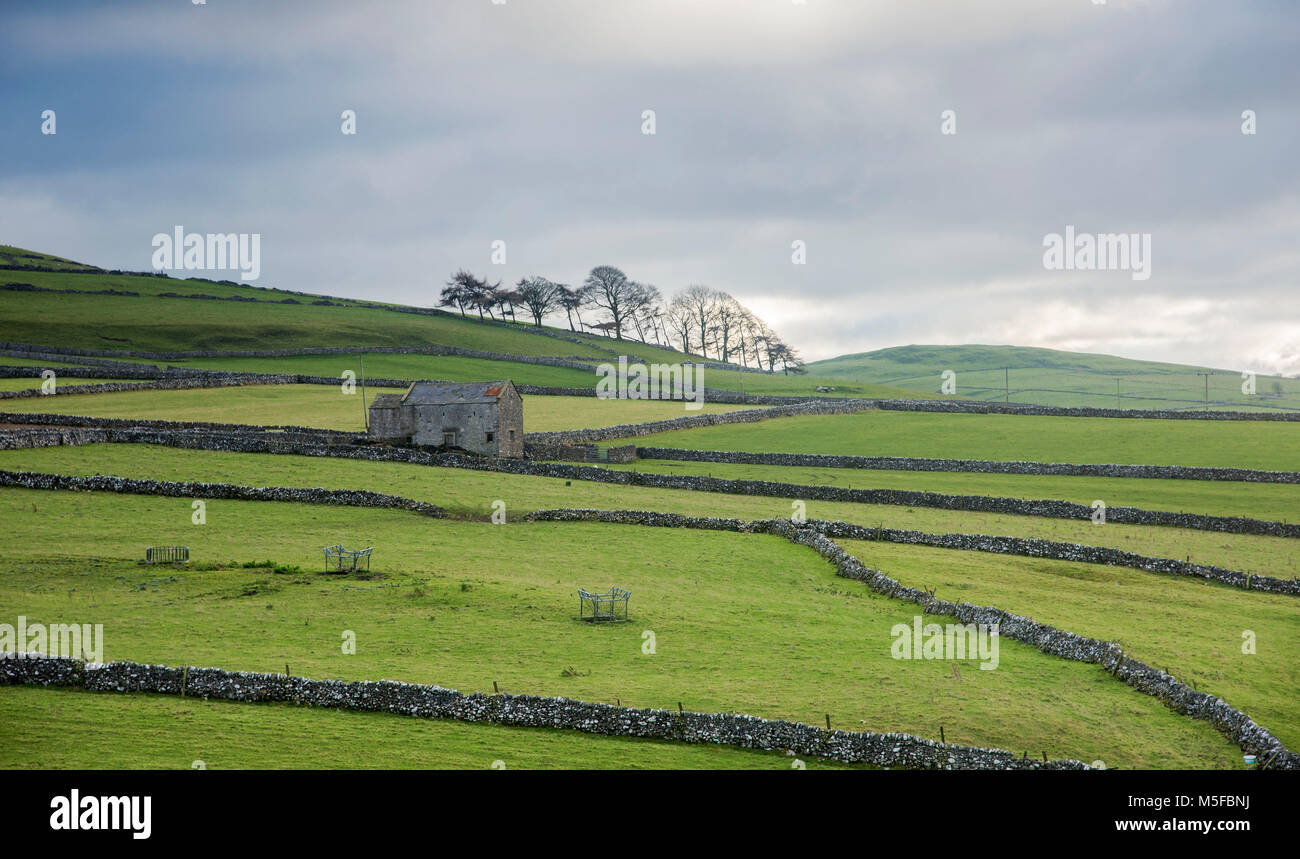 The Derbyshire peak district countryside showing an old barn and