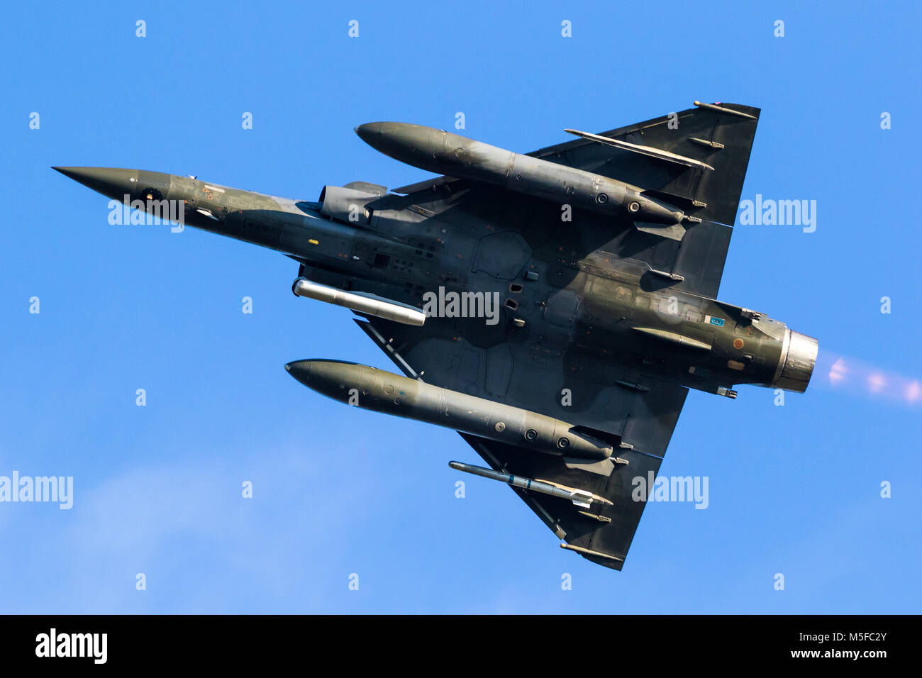 bottom view of a military fighter jet aircraft in flight Stock Photo Alamy
