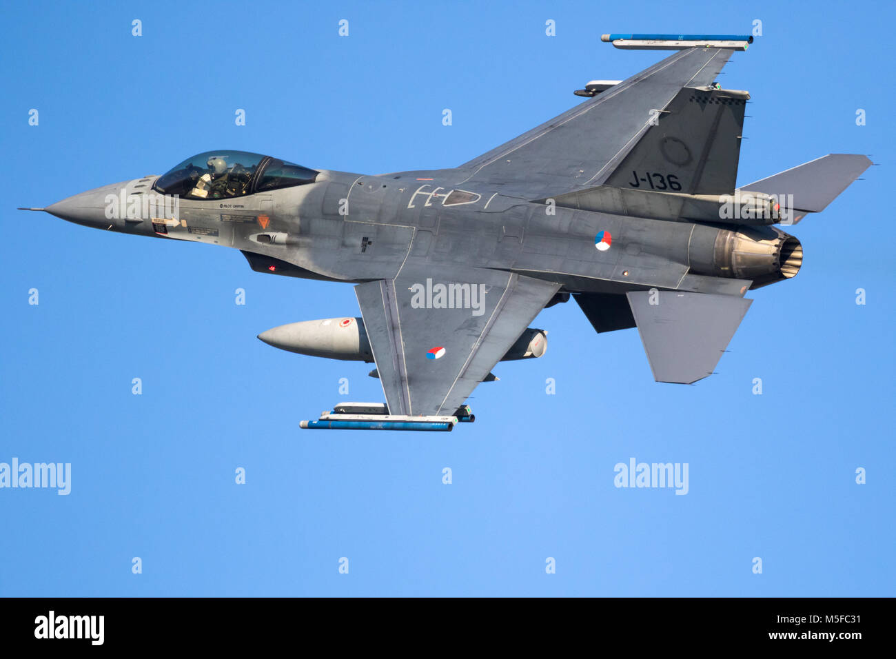 LEEUWARDEN, THE NETHERLANDS - MRT 28, 2017: Royal Netherlands Air Force F-16 fighter jet plane taking off during NATO exercise Frisian Flag Stock Photo