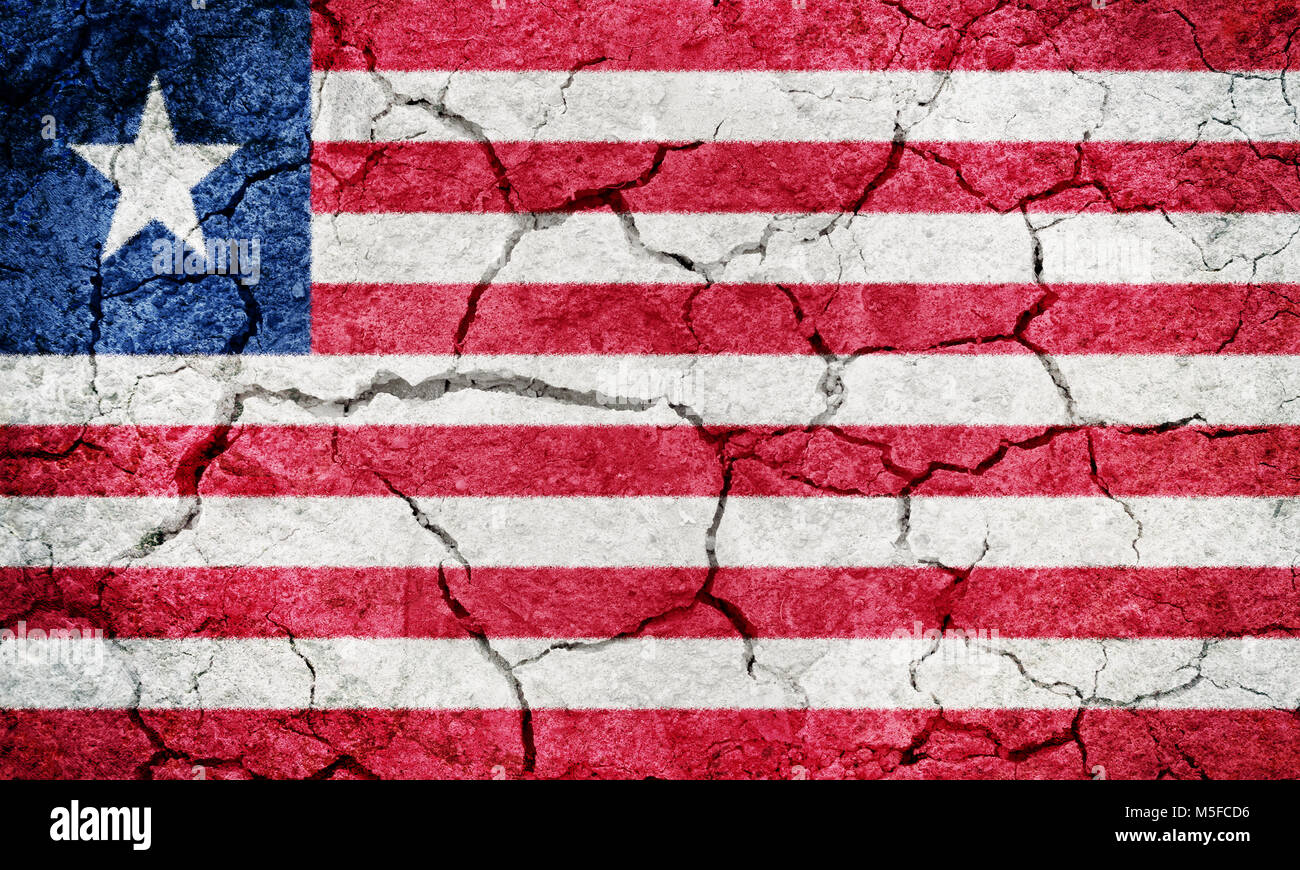 Republic of Liberia flag on dry earth ground texture background Stock ...