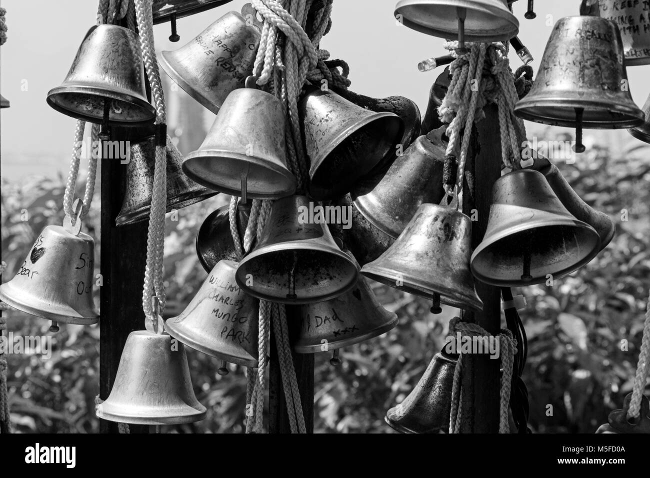 SINGAPORE, December 10, 2017: Close up of many beautiful old fashioned golden christmas bells hanging at Faber Peak gift shop, Singapore. Stock Photo