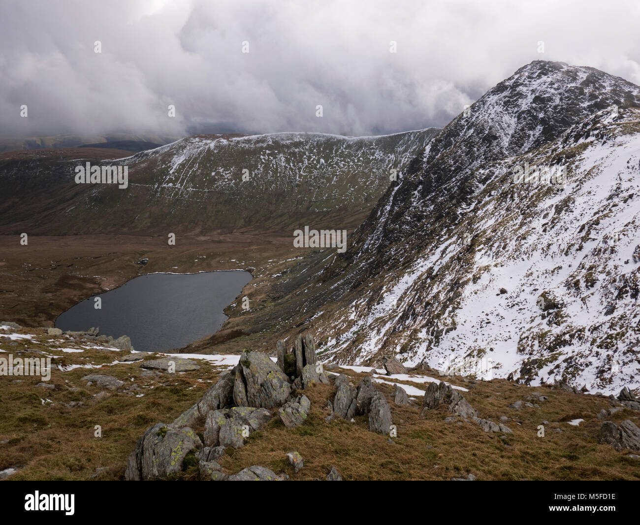 Creiglyn Dyfi, source of the river Dyfi (Dovey), nestled beneath the peak of Aran Fawddwy, with Drysgol beyond. The Aran ridge, Snowdonia. Stock Photo