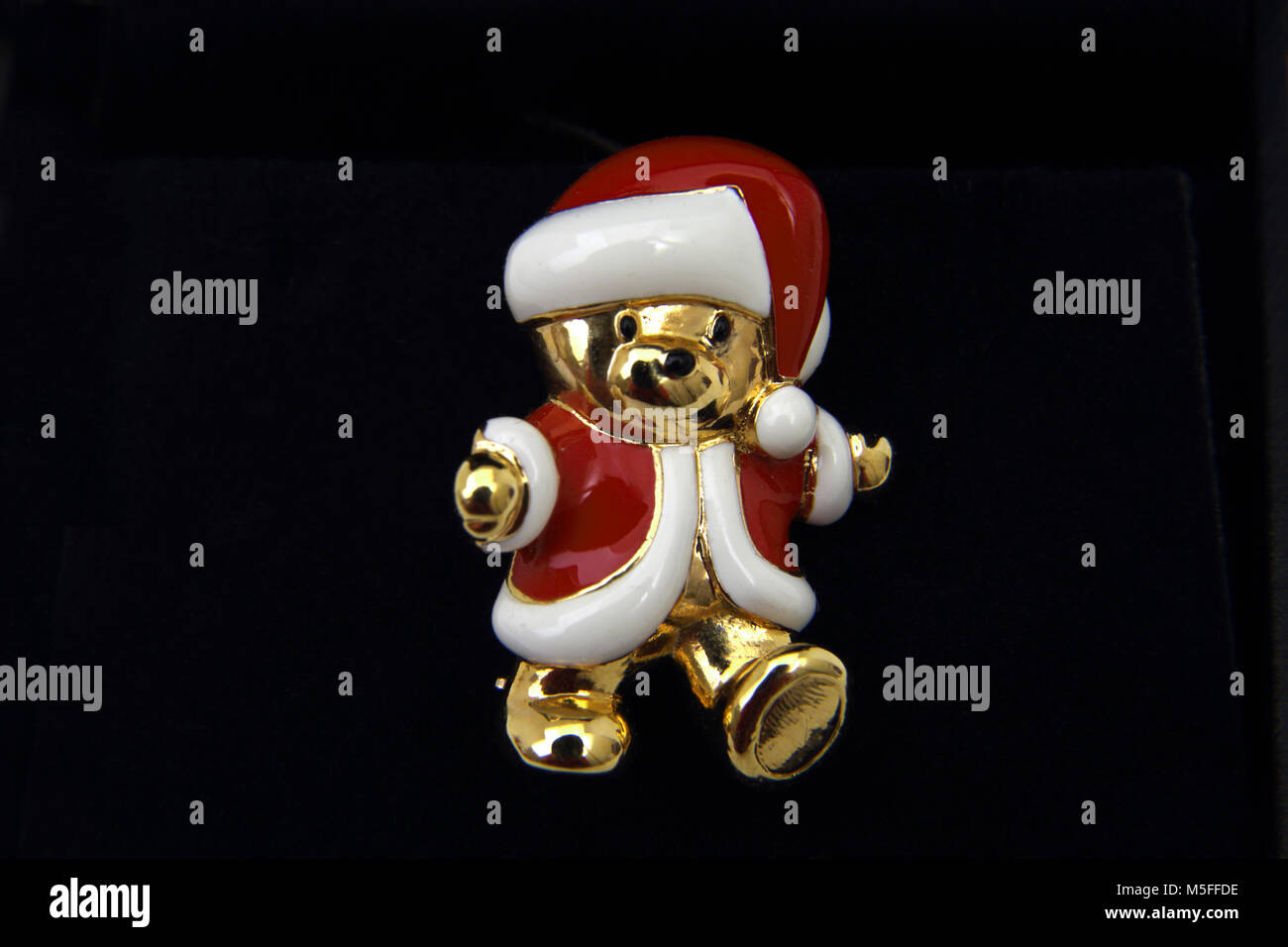 Gold Bear Brooch With Enamel Santa Hat And Suit Stock Photo