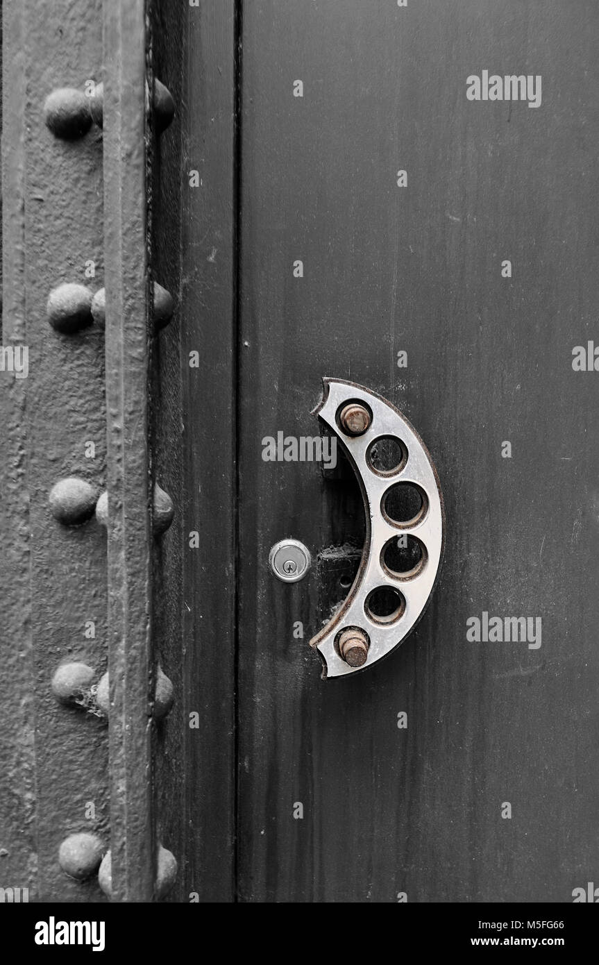 Decorative Metal Door Handle On A Side Back Entrance Door Of A
