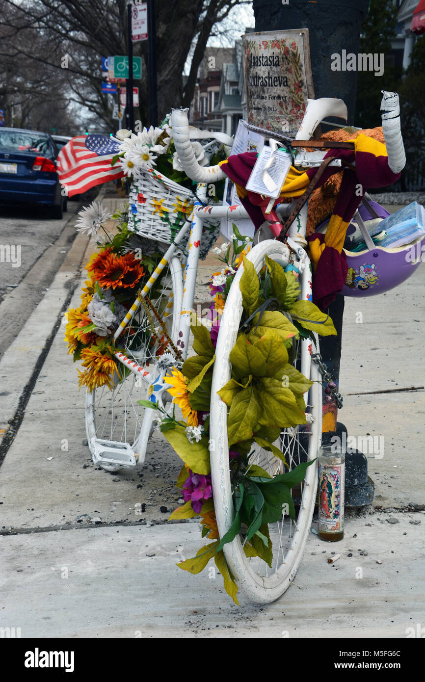 A ghost bike memorial marks the spot in Chicago where 23-year-old Anastasia Kondrasheva was struck and killed by a construction truck Sept. 26, 2016. Stock Photo