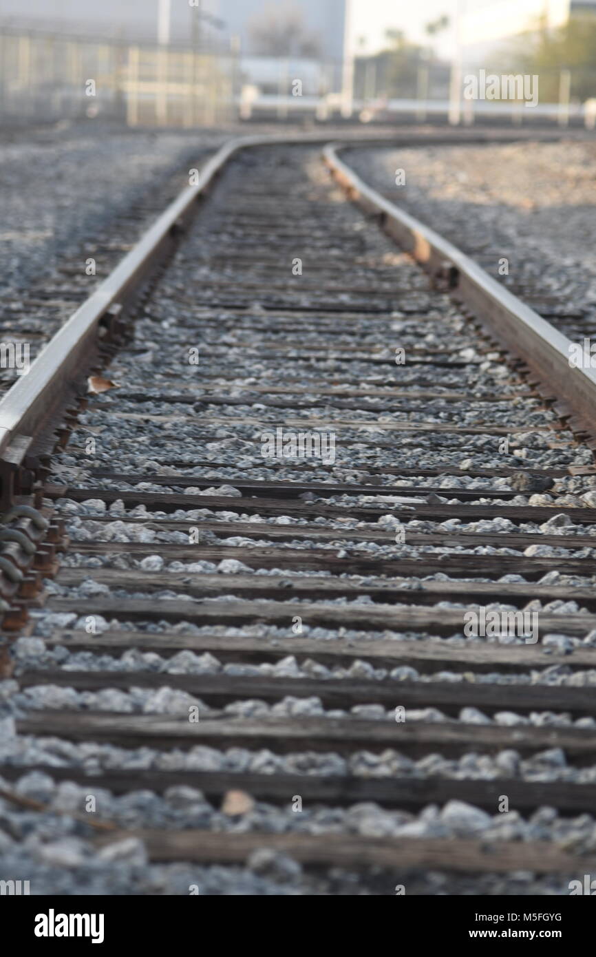 Railroad tracks bending right in distance Stock Photo Alamy