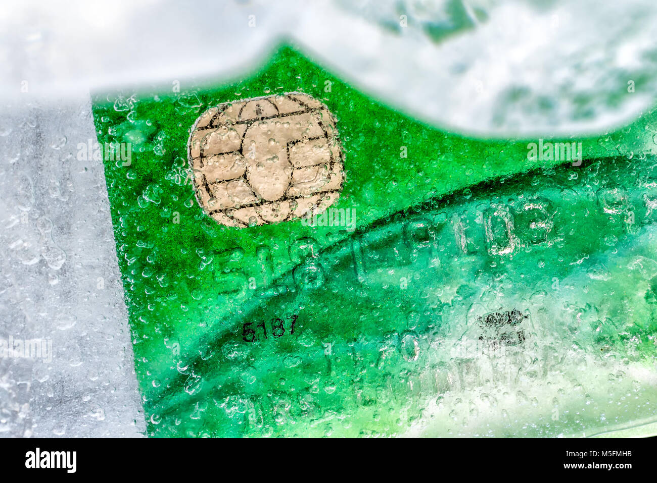 Closeup view ice frozen credit debit card Stock Photo Alamy