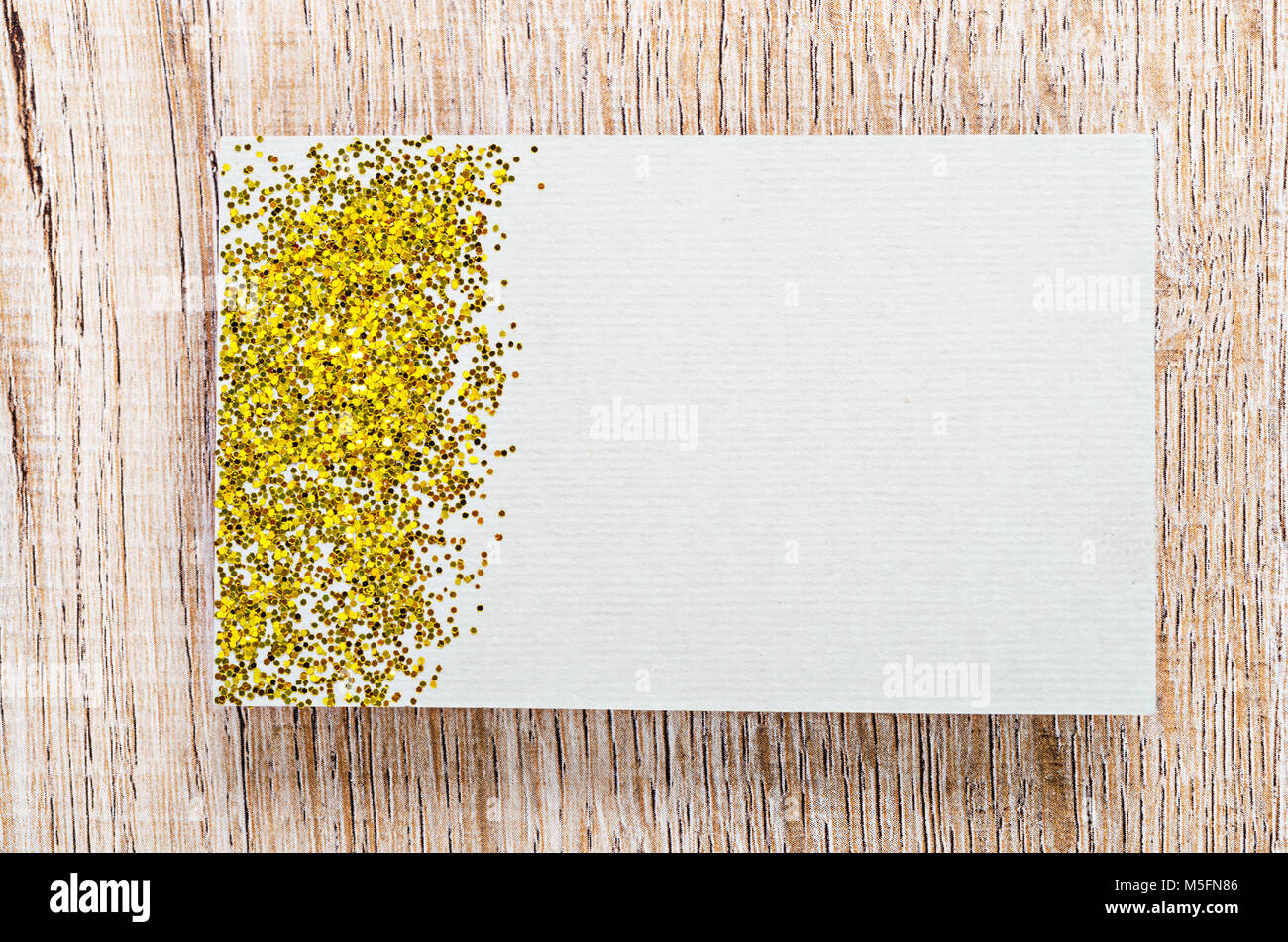blank card with gold glitter for your text or message on