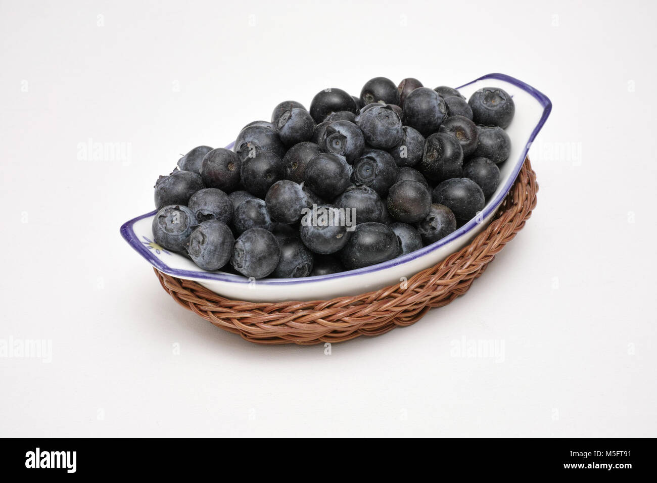 basket with blueberries fruits Stock Photo
