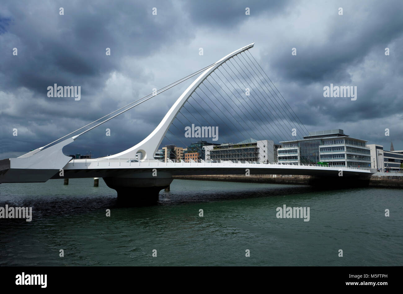 The Samuel Beckett Bridge is designed by Santiago Calatrava, a designer of a number of innovative bridges and buildings. The cable-stayed bridge joins Stock Photo