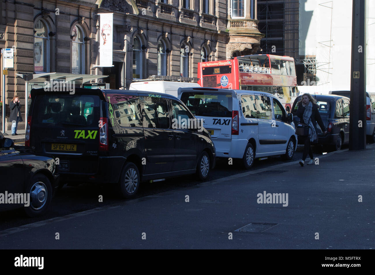 Taxis at temporary taxi rank, Glasgow, Scotland Stock Photo