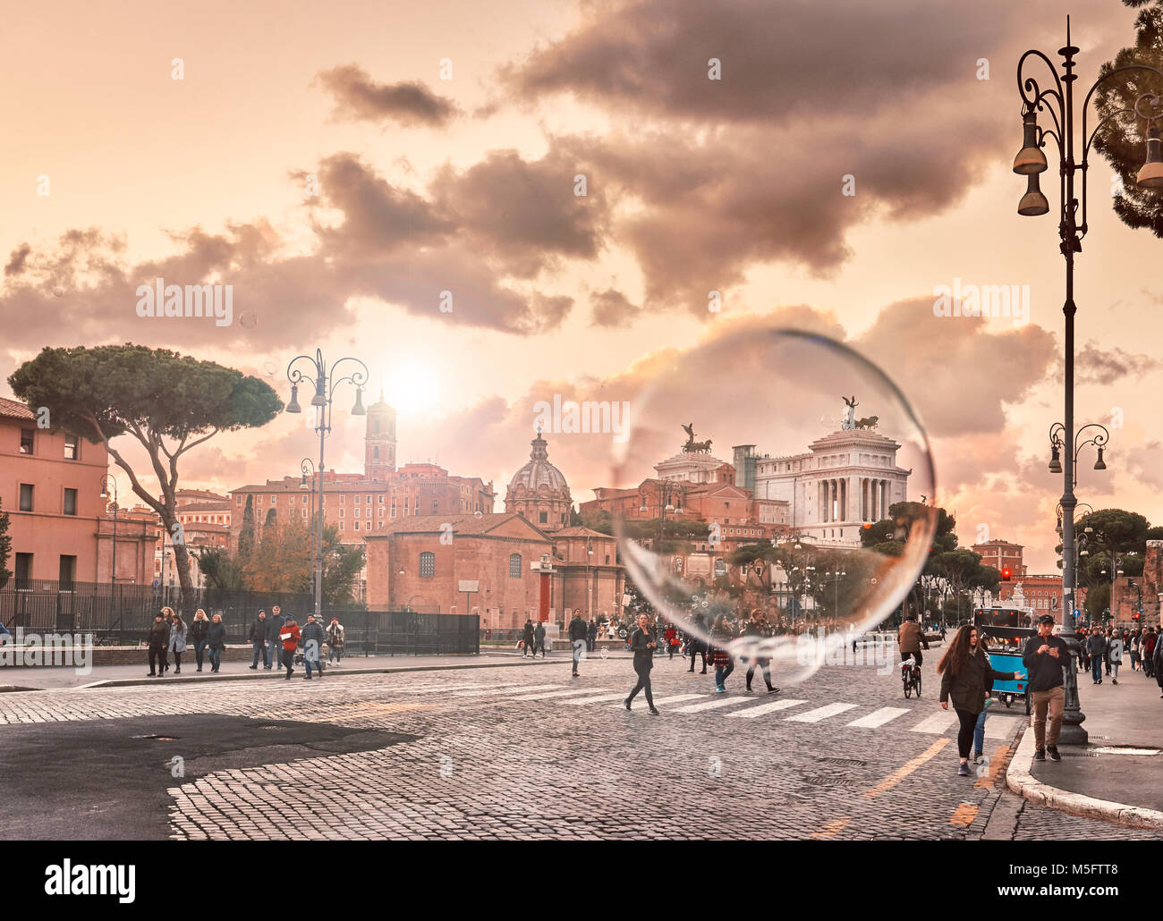 Italy, Rome, November 30 / 2017 Imperial Forum street view of the Vittoriano, close up of soap bubble surrounding the Vittoriano (Altar of the Homelan Stock Photo