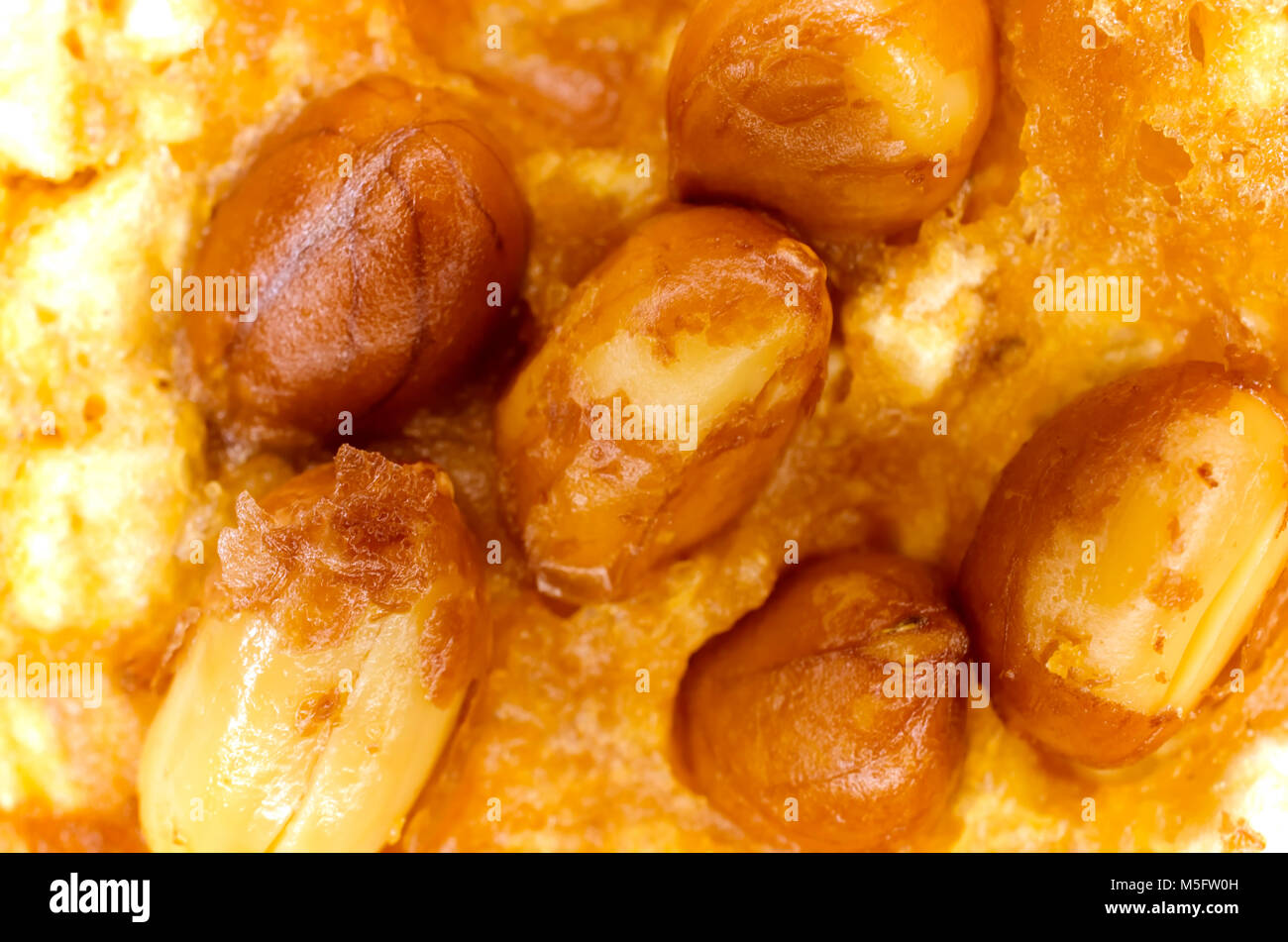 Fry peanut topping on fry rice flour, close up photo image of peanut