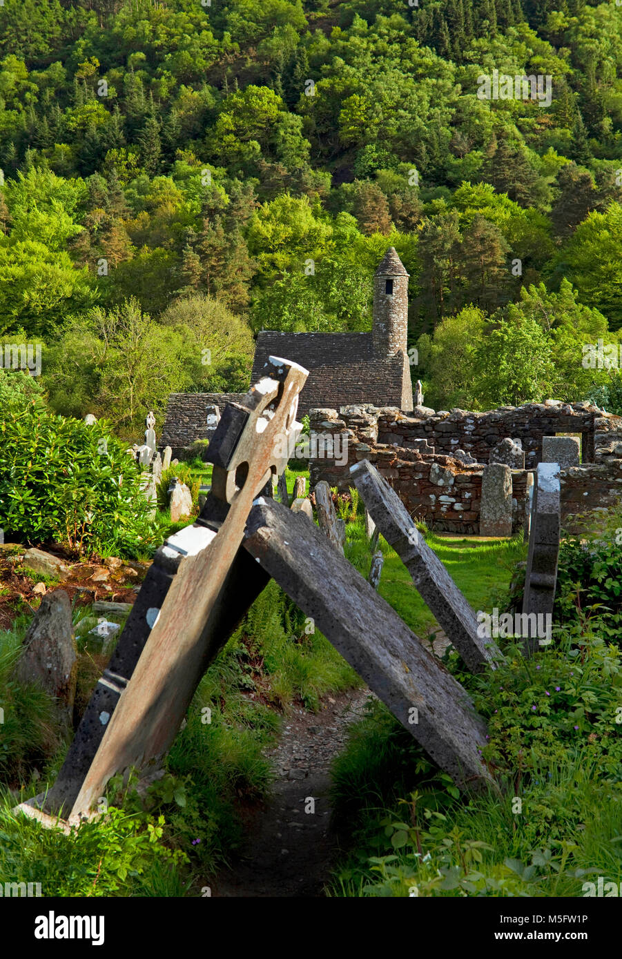 The 9th to 11th Century St Kevin's Church aka St Kevin's Kitchen is a stone-roofed building. The steep roof, formed of overlapping stones, is supporte Stock Photo