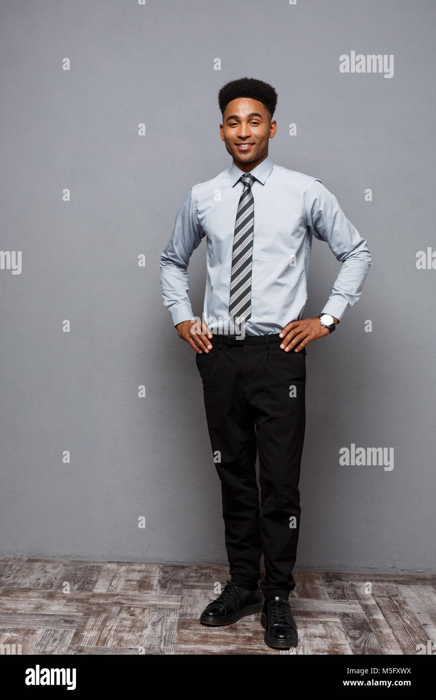 Business Concept - Full length portrait of confident african american ...