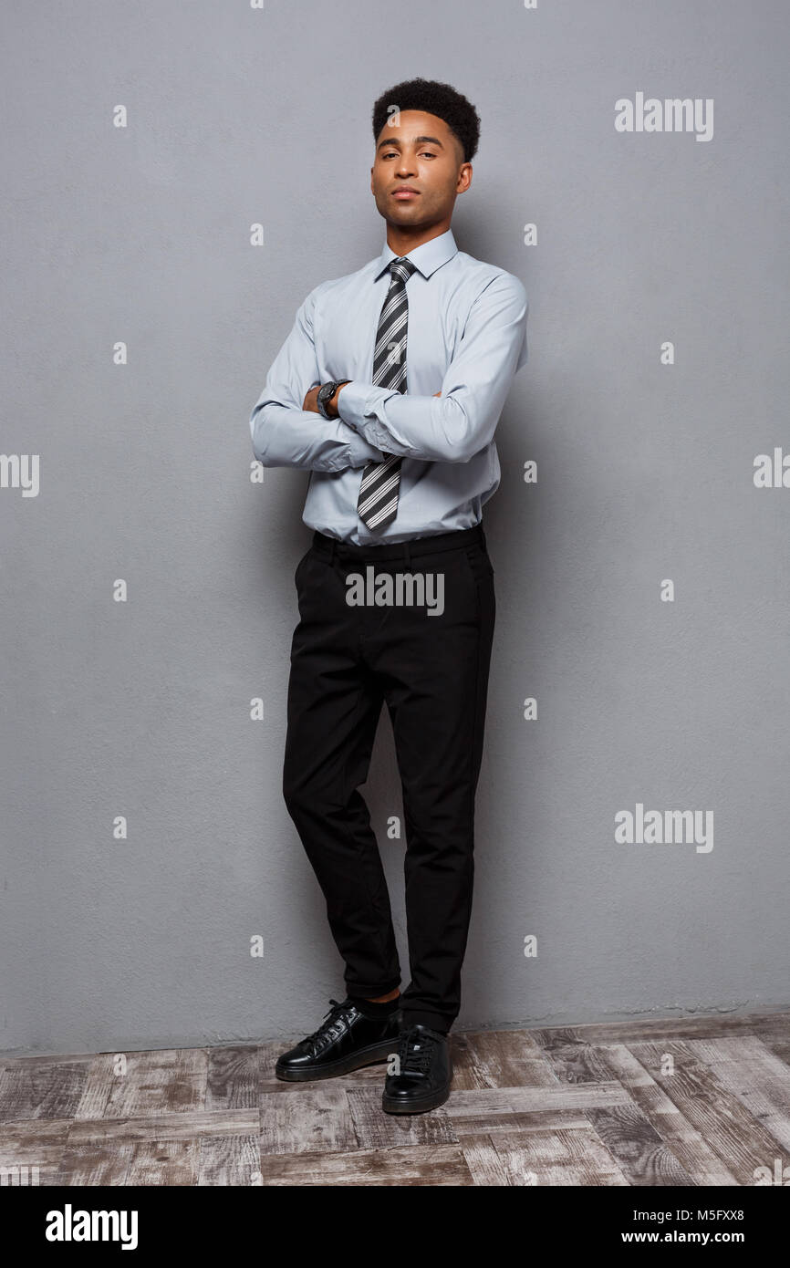 Business Concept - Full length portrait of confident african american ...